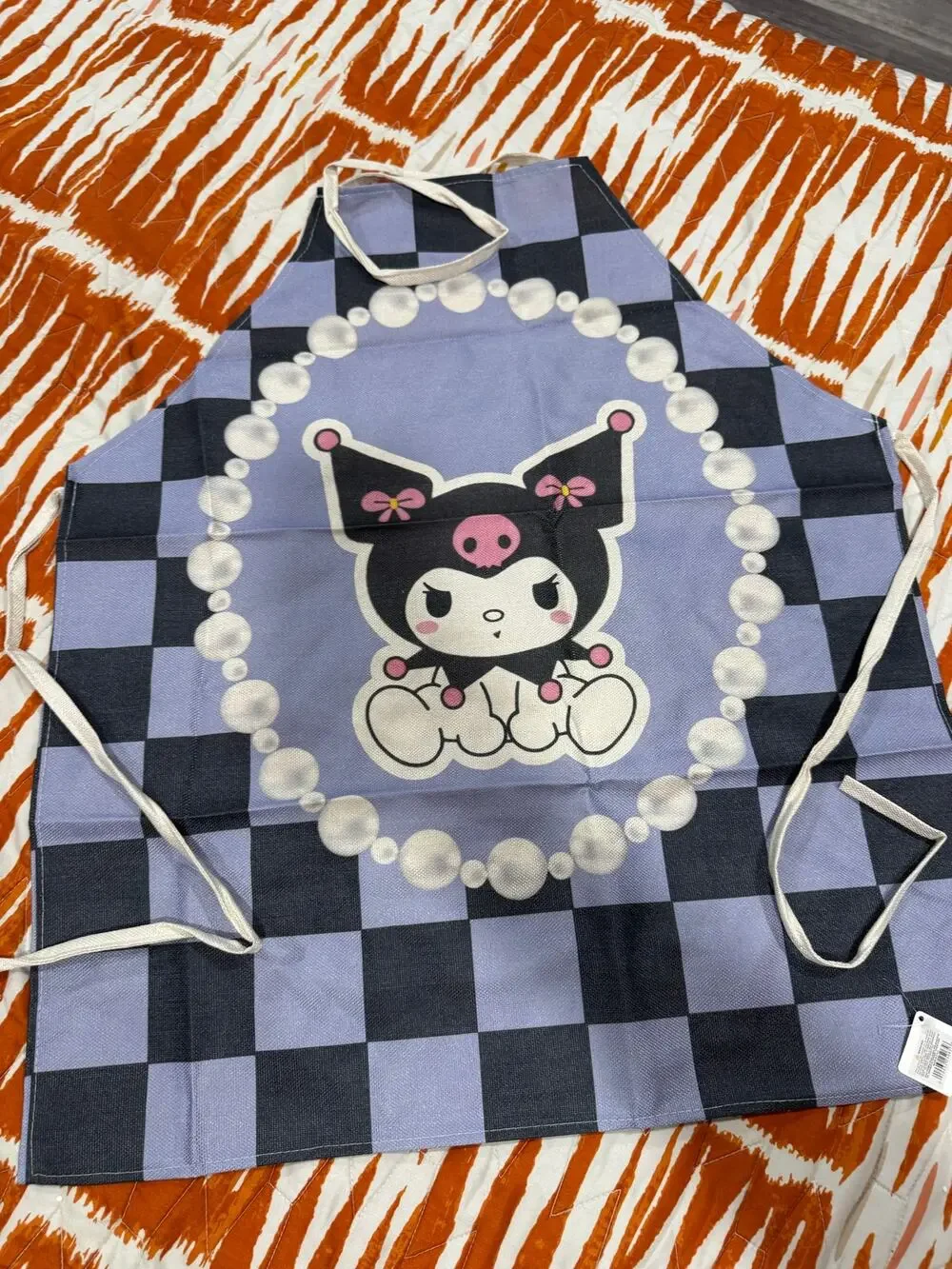 Sanrio Kuromi black and purple checkered apron with pearl necklace graphic
